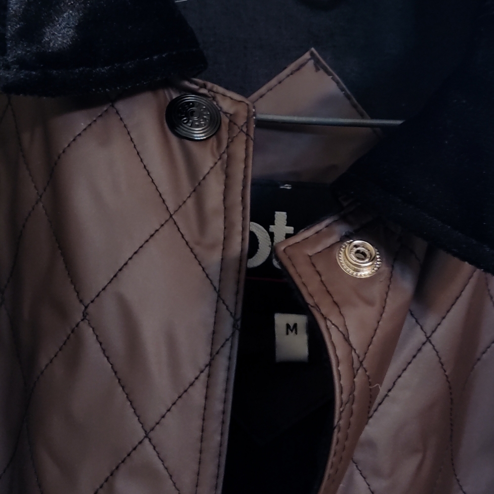 Totes rain jacket used still like New